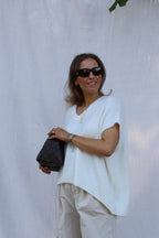 Elora mouwloze v-neck knit ecru