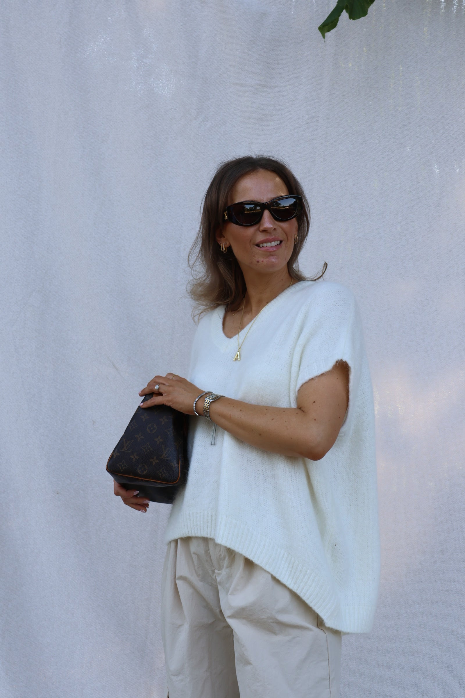 Elora mouwloze v-neck knit ecru