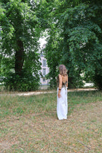 Flo ruffle top met open rug kaki