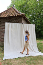 Flo ruffle top met open rug blauw