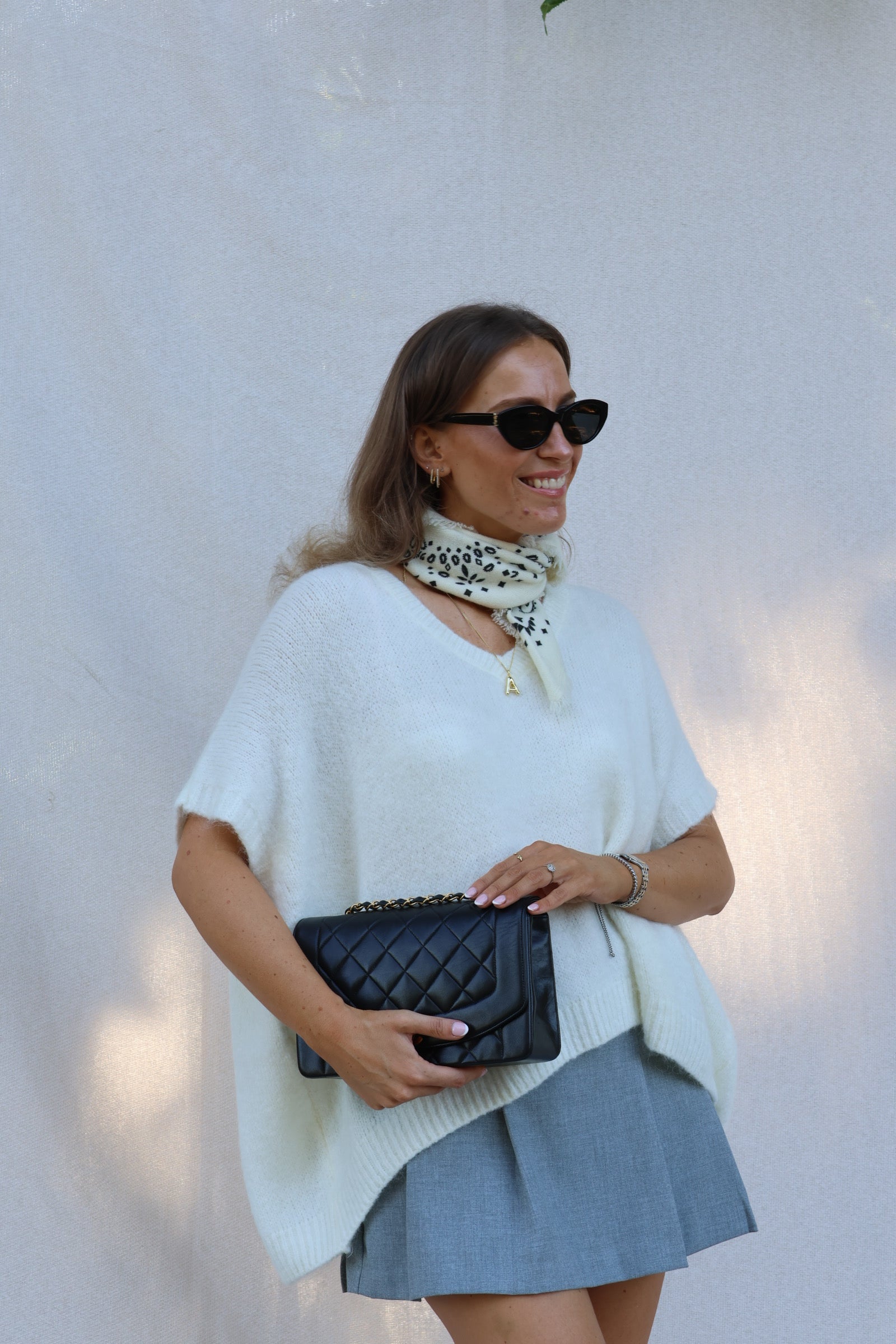 Elora mouwloze v-neck knit ecru
