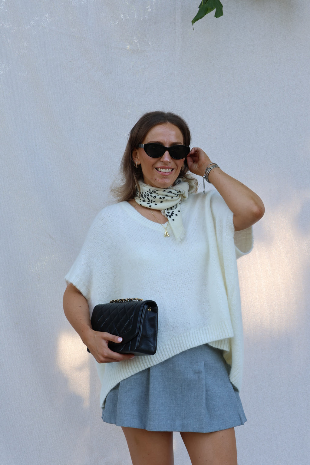 Elora mouwloze v-neck knit ecru