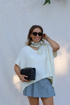 Elora mouwloze v-neck knit ecru