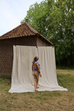 Flo ruffle top met open rug blauw
