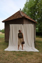 Flo ruffle top met open rug kaki