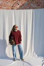 Coco wide leg jeans met asymmetrische knoop