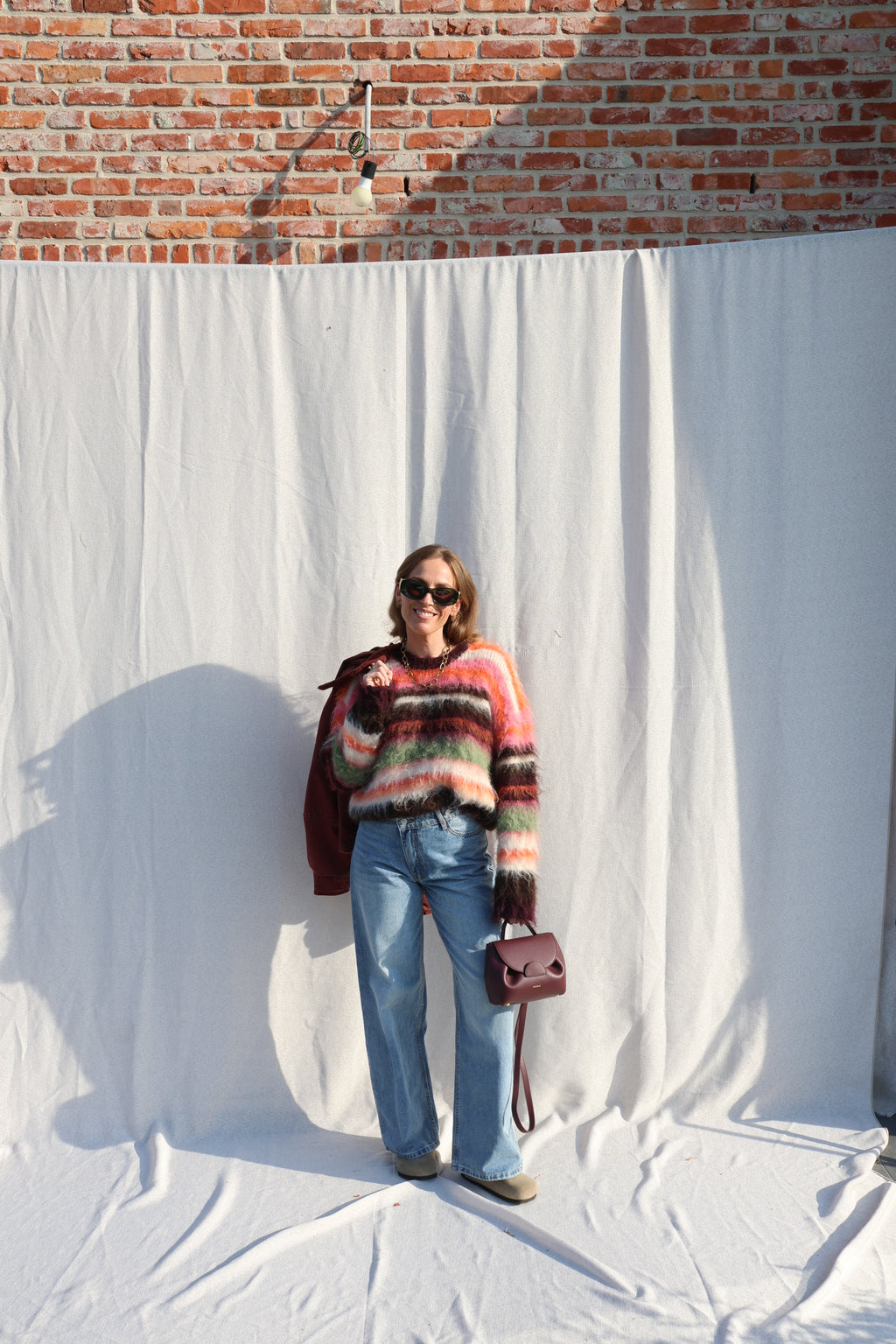 Coco wide leg jeans met asymmetrische knoop