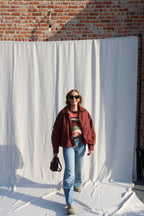 Coco wide leg jeans met asymmetrische knoop