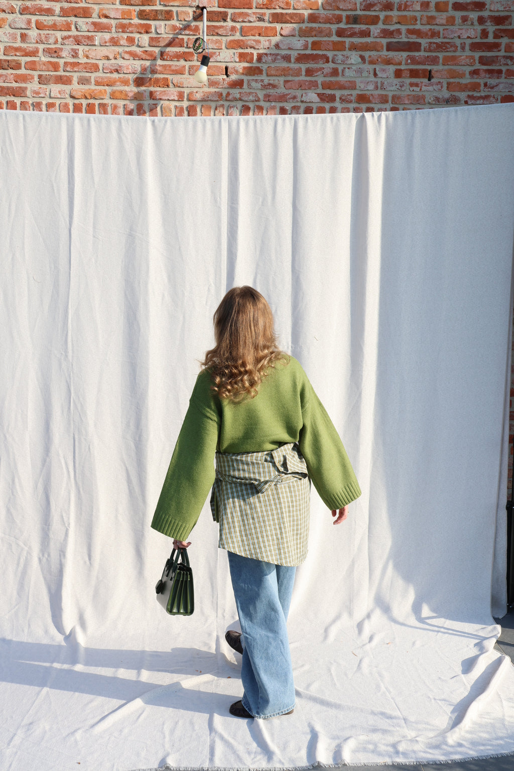 Coco wide leg jeans met asymmetrische knoop
