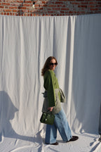 Coco wide leg jeans met asymmetrische knoop