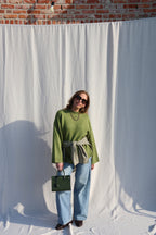 Coco wide leg jeans met asymmetrische knoop