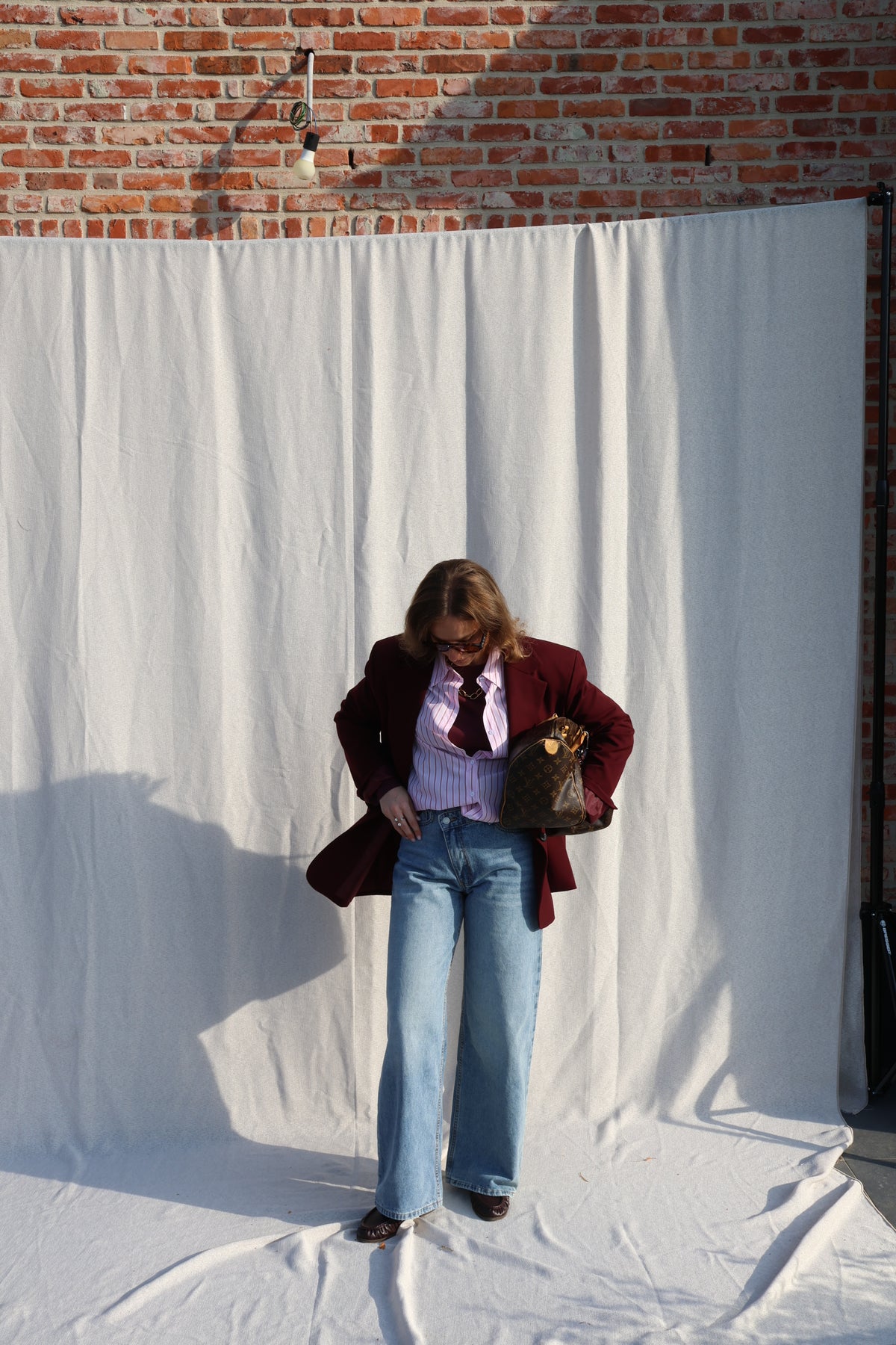 Coco wide leg jeans met asymmetrische knoop