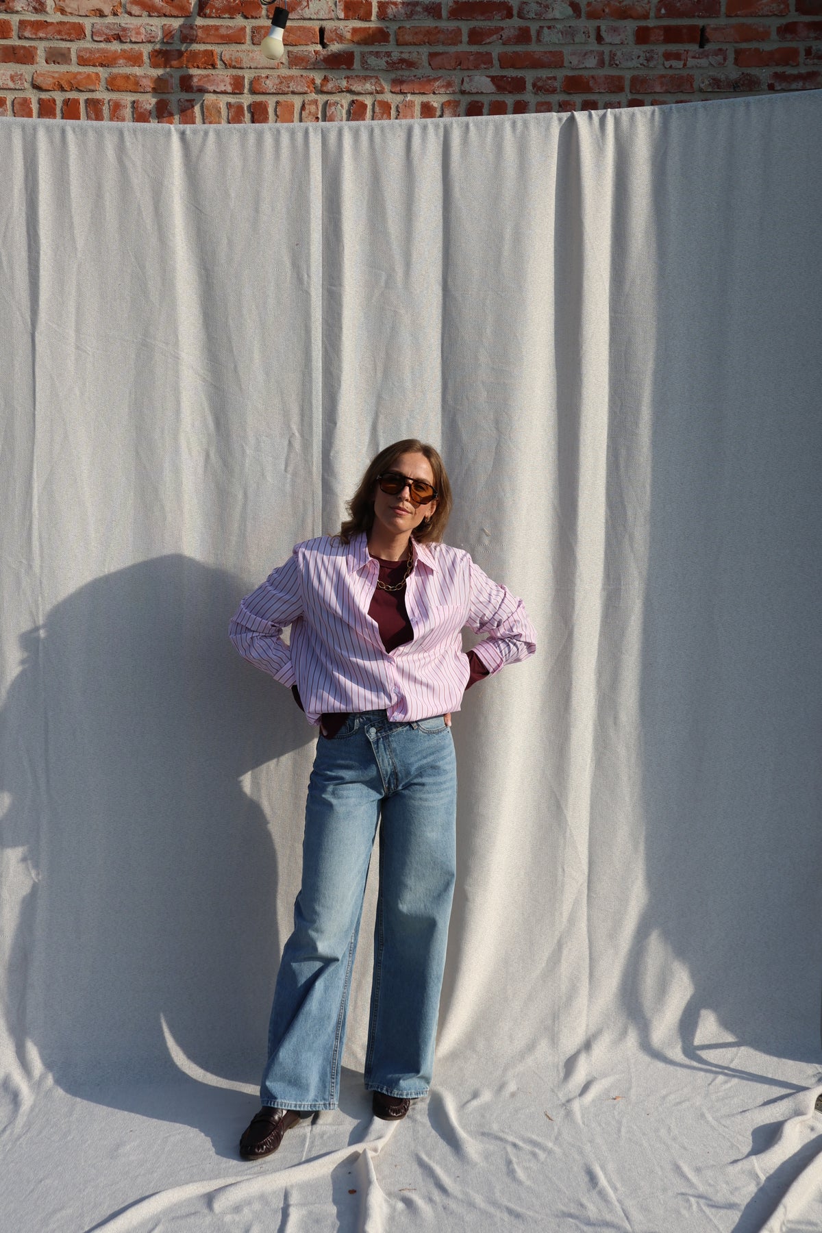 Coco wide leg jeans met asymmetrische knoop