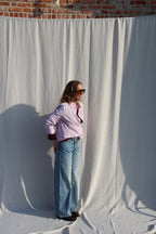 Coco wide leg jeans met asymmetrische knoop