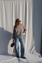 Coco wide leg jeans met asymmetrische knoop