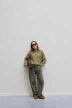 Lina trui groen met mandarin detail