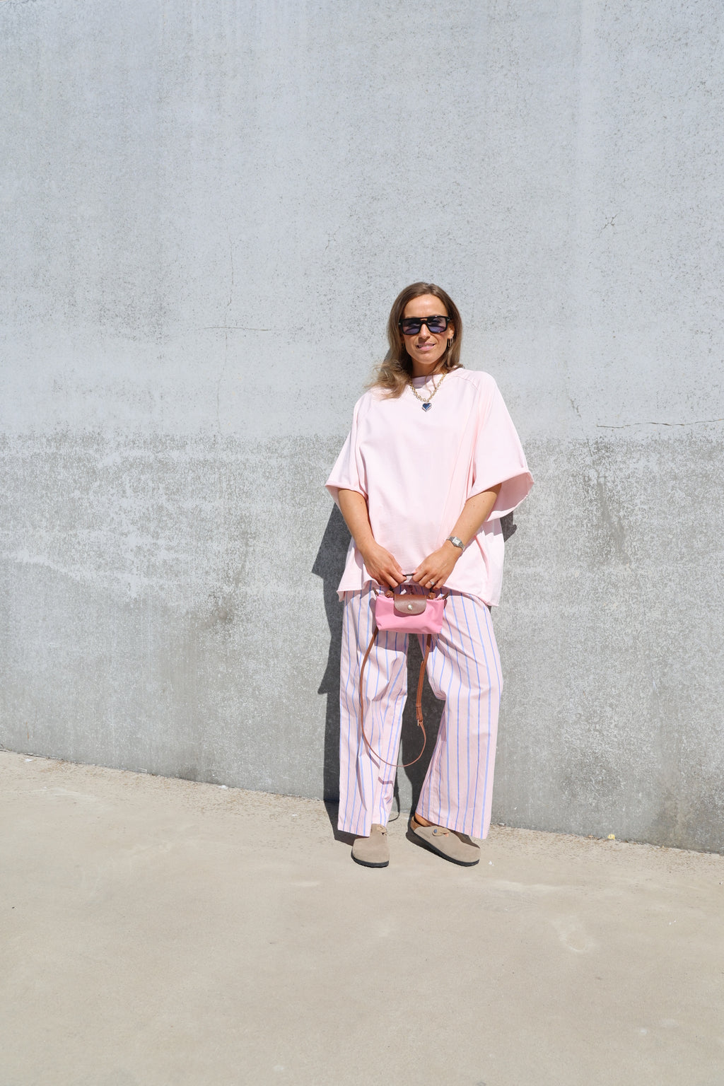 Winnie gestreepte broek met detail roze