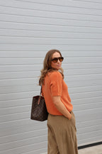Florien knit met korte mouwen oranje