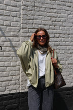Soraya faux leather vestje zachtgroen