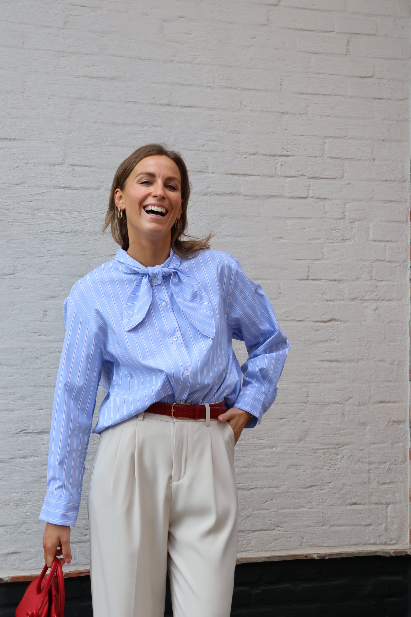 Julie gestreept hemdje met strik lichtblauw