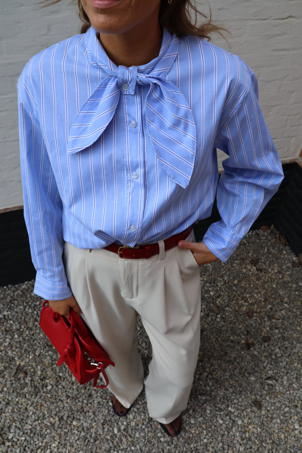 Julie gestreept hemdje met strik lichtblauw