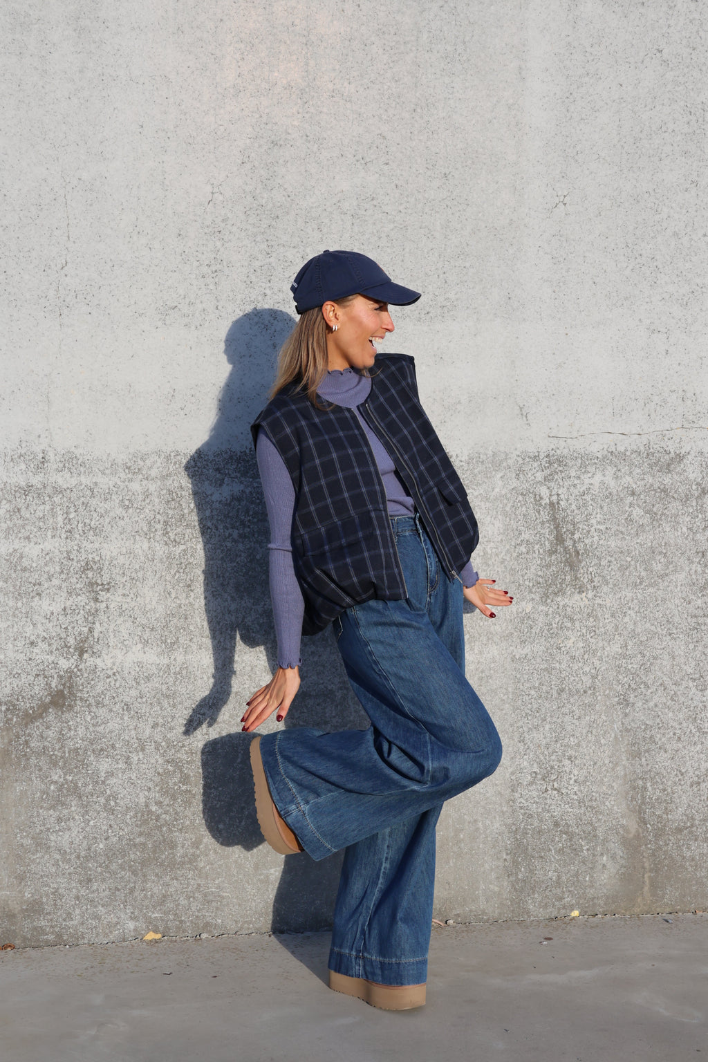 Faye mouwloos vestje carreaux marine