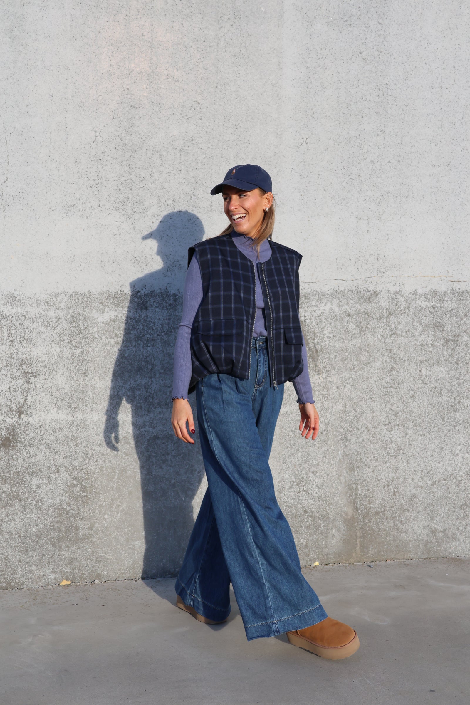 Faye mouwloos vestje carreaux marine