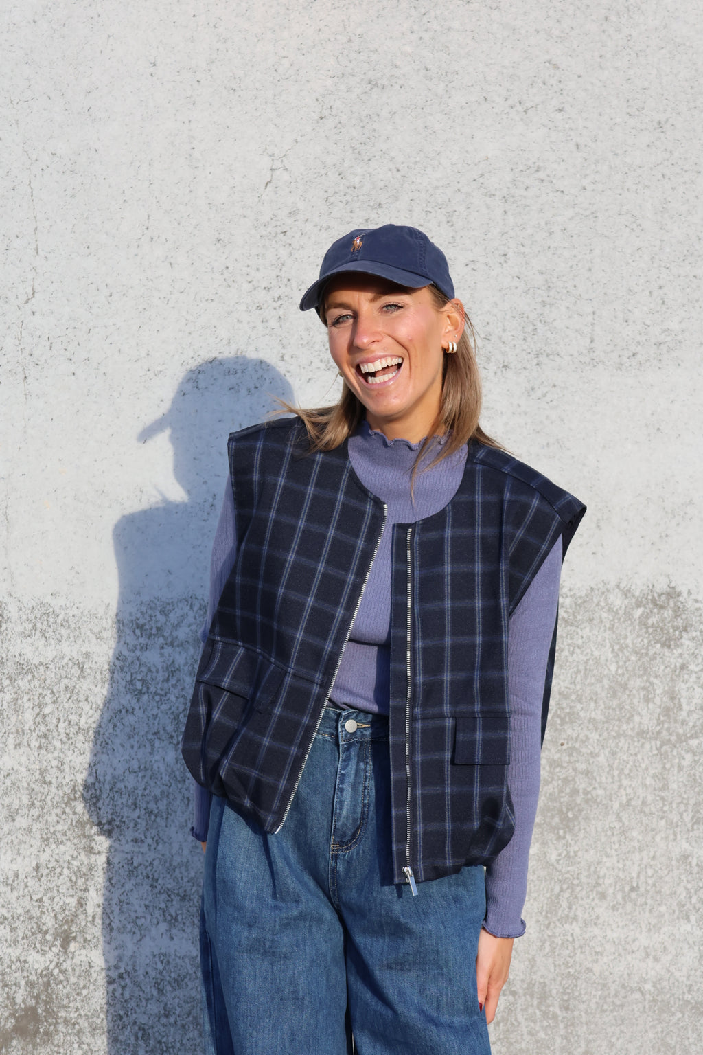 Faye mouwloos vestje carreaux marine