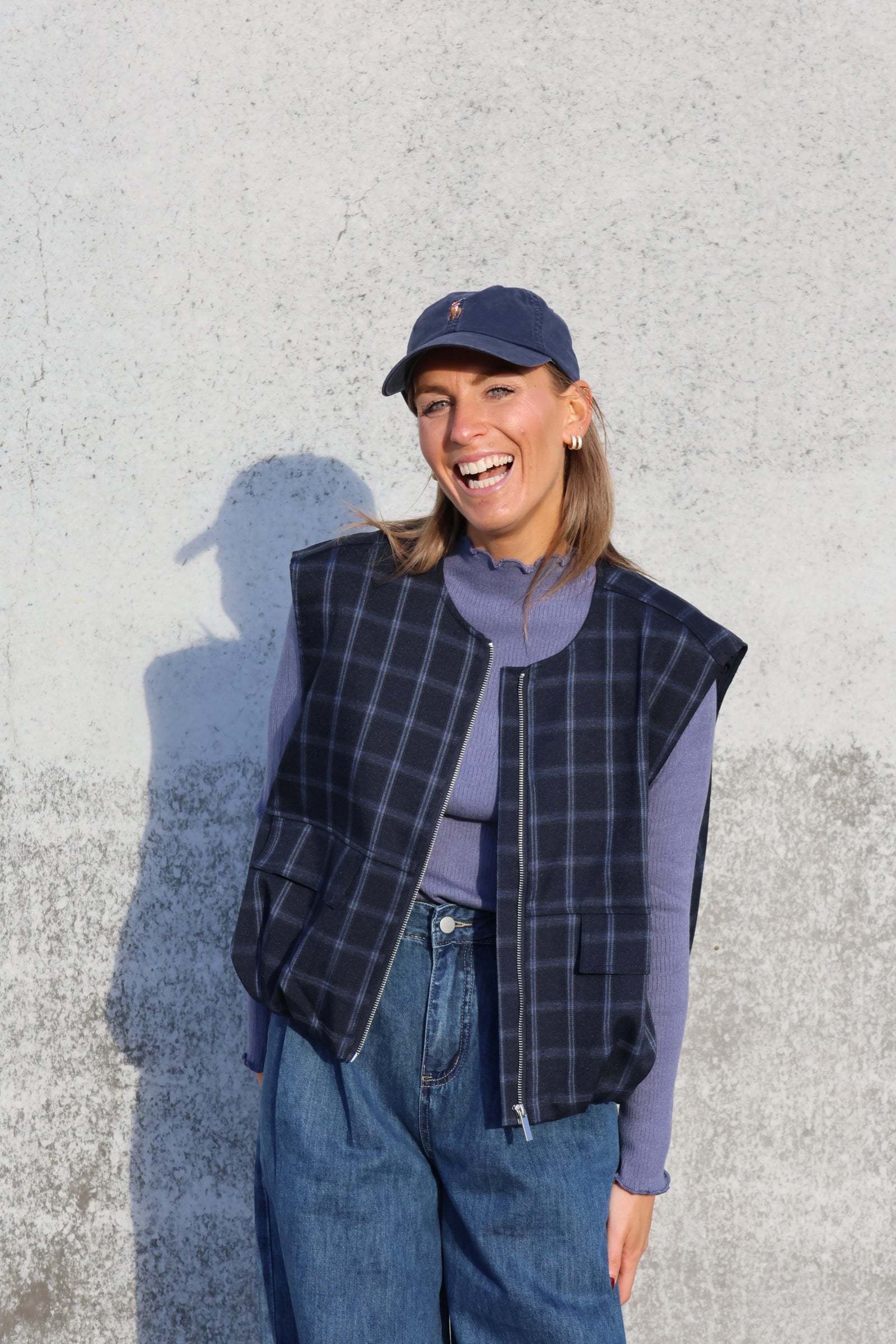 Faye mouwloos vestje carreaux marine