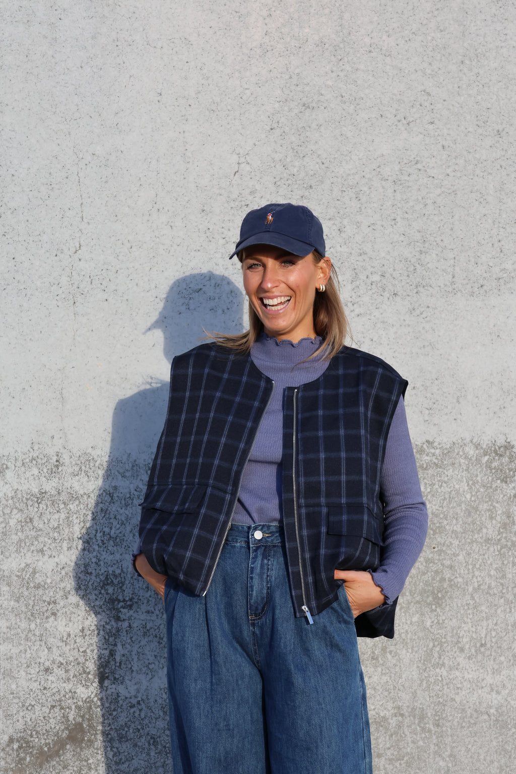 Faye mouwloos vestje carreaux marine