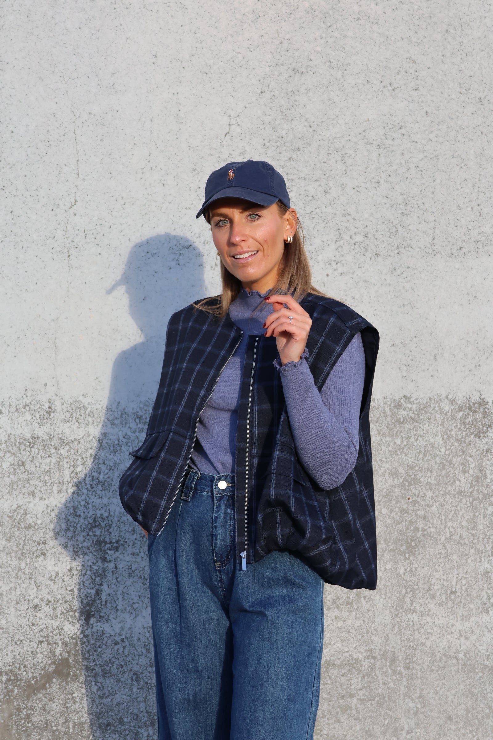 Faye mouwloos vestje carreaux marine