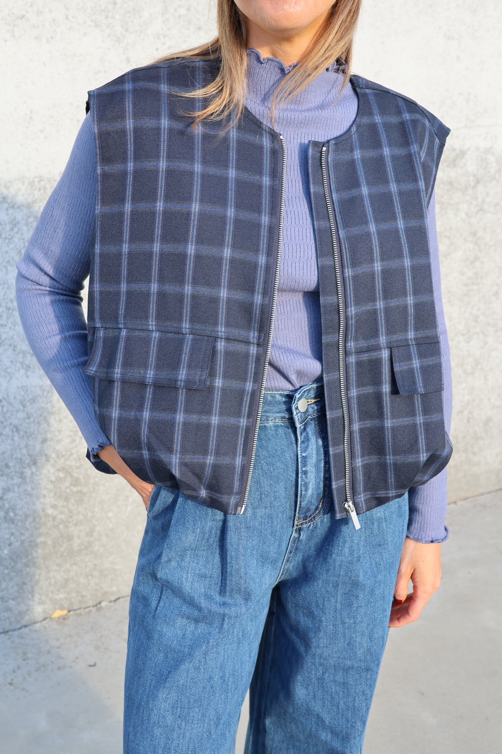 Faye mouwloos vestje carreaux marine