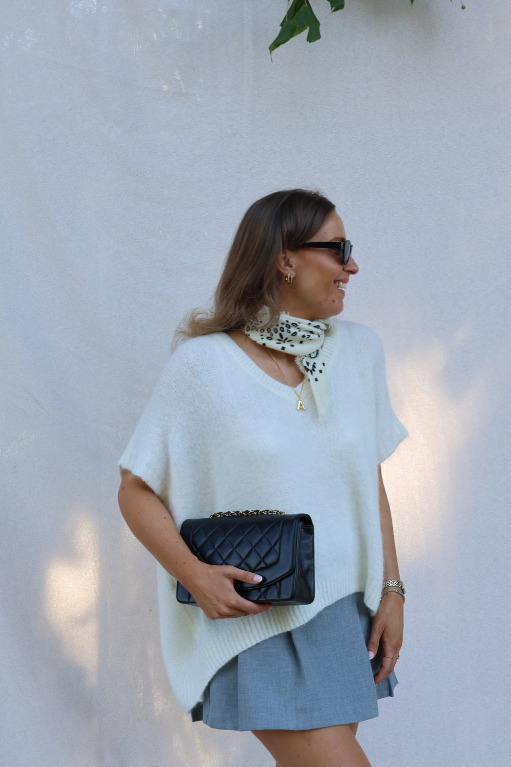 Elora mouwloze v-neck knit ecru