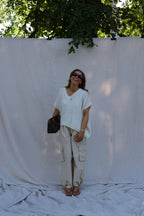 Elora mouwloze v-neck knit ecru